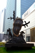 This statue is located in the West Nanjing area of Shanghai, China. The inscription read that this bronze piece was created by Salvador Dali in Switzerland. This is supposed to be one of two pieces with the second located in London.